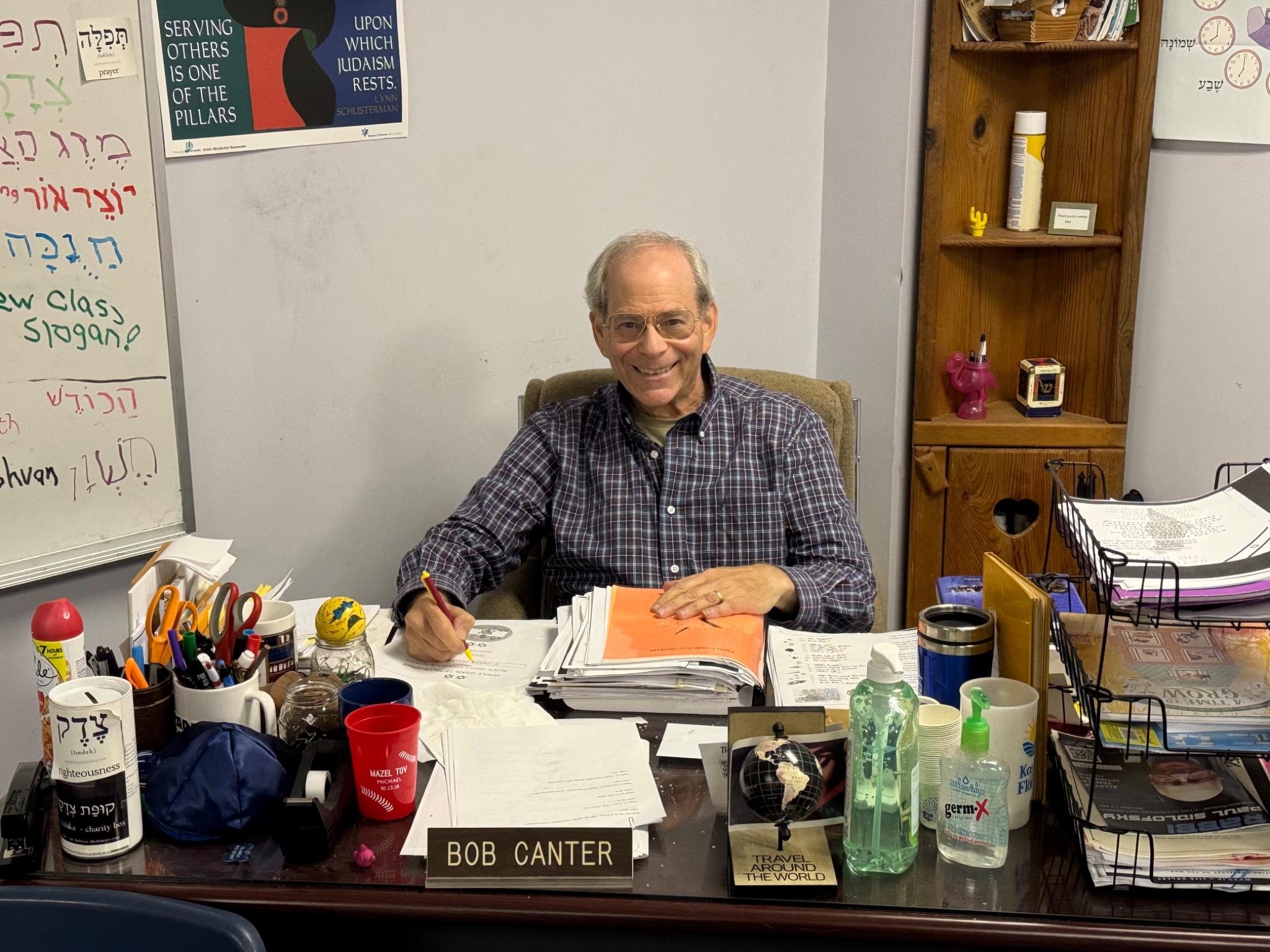 Bob Canter at his classroom desk at Temple Israel in Tallahassee